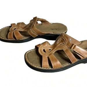 Clark s sandals ,Men size 7, Tan color,leather upper,slip on,velcro adjustable